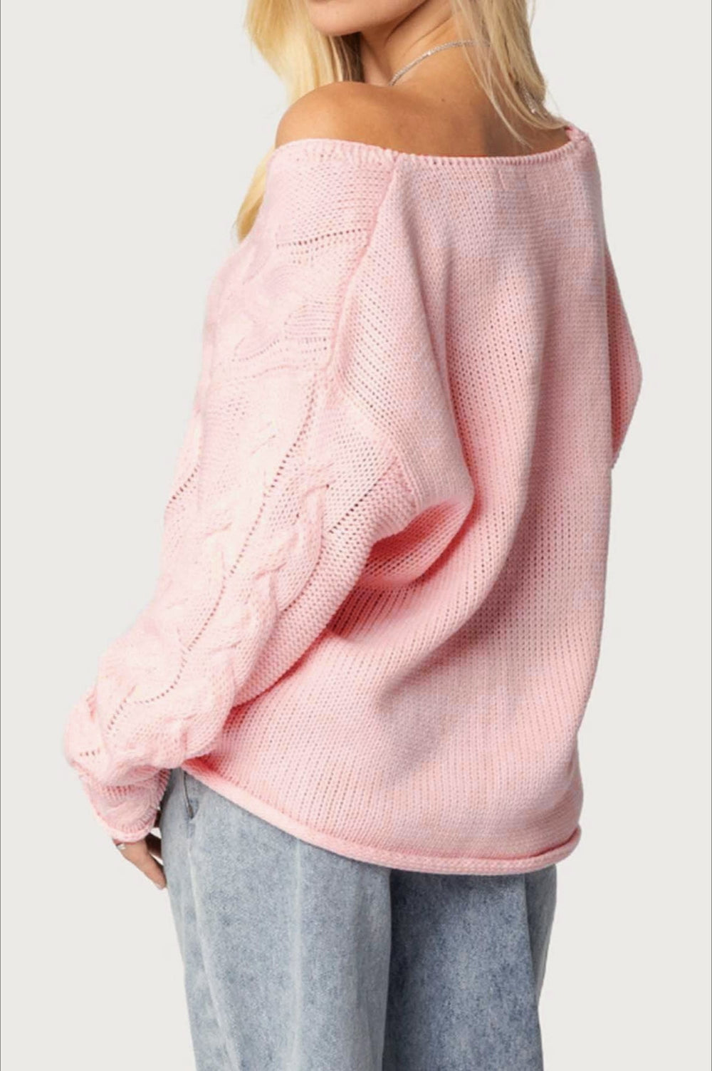 Locker geschnittener Pullover mit V-Ausschnitt und Strickstruktur in Rosa