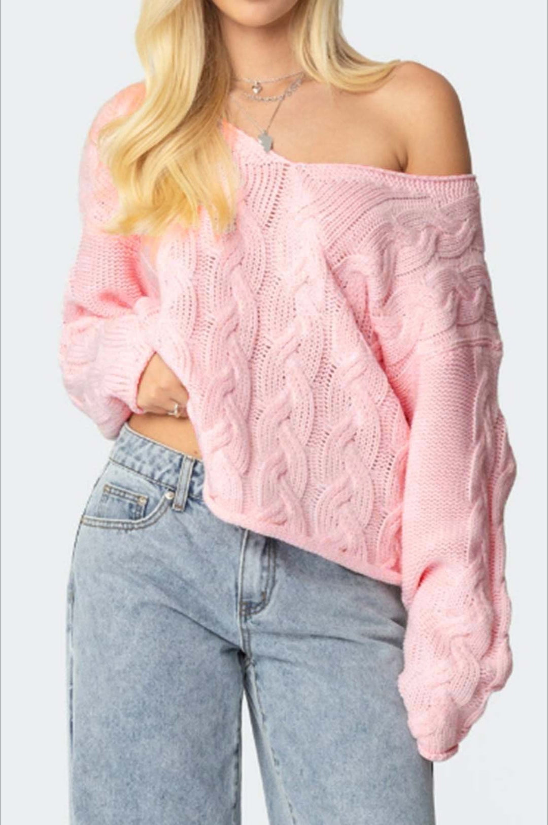 Locker geschnittener Pullover mit V-Ausschnitt und Strickstruktur in Rosa