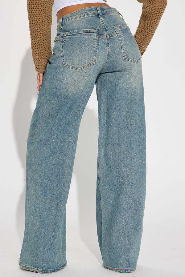 Jeans mit weitem Bein und Stickerei in Vintage Blau