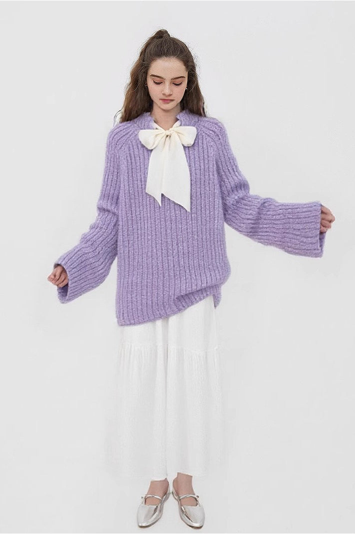 Locker geschnittener Pullover mit Strickstruktur, Pailletten und Schleifendetail