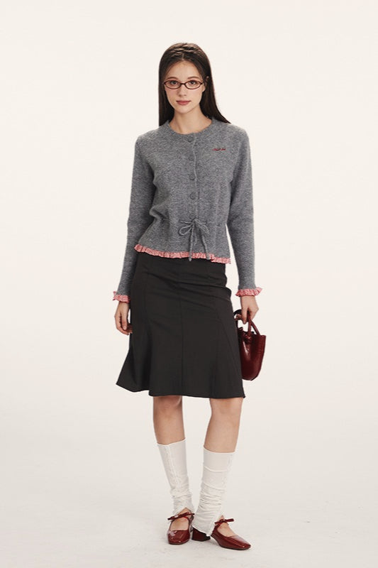 Strickjacke mit Raffung und Strickstruktur