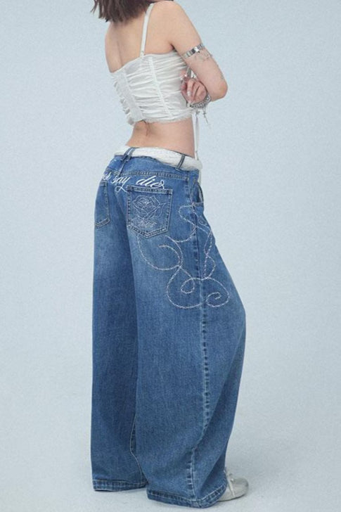 Jeans mit weitem Bein und Stickerei in Blau – Ausführung 2