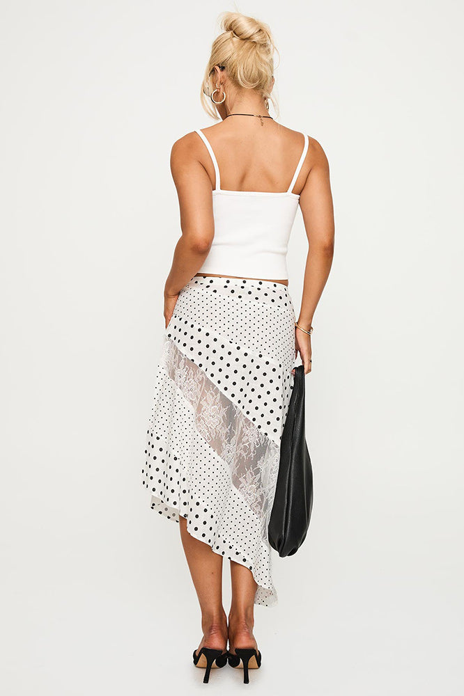 Asymmetrischer Maxirock mit Punktemuster und Spitze