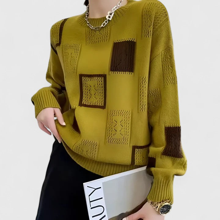 Strickpullover im Patchwork-Design mit Lochmuster und Rundhalsausschnitt